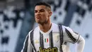 Kembalinya Cristiano Ronaldo ke Manchester United musim ini setelah sempat berkiprah selama 3 musim di Liga Italia bersama Juventus, menambah daftar rekrutan Setan Merah yang berasal dari alumnus Liga Italia. Tercatat ada 7 pemain sebelum CR7. Siapa sajakah? (Foto: AFP/Marco Bertorello)