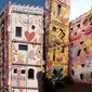 James Rizzi seorang seniman yang berhasil mendesain sebuah bangunan yang penuh dengan warna-warni. (Foto: Oddity Central)