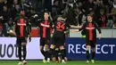 Penyerang Bayer Leverkusen melakukan selebrasi saat pertandingan sepak bola leg kedua babak 16 besar Grup Liga Eropa UEFA melawan Qarabag, di Leverkusen, Jerman pada 14 Maret 2024. (INA FASSBENDER/AFP)