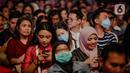 Sejumlah pengunjung menggunakan masker saat menyaksikan Java Jazz Festival 2020 di JIExpo Kemayoran, Jakarta, Jumat (28/2/2020). Promotor meminta penonton memakai masker saat menghadiri Java Jazz Festival 2020 untuk mengantisipasi penyebaran virus corona. (Liputan6.com/Faizal Fanani)