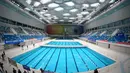 Foto pada 28 Juli 2020 menunjukkan "Water Cube", tempat penyelenggaraan kompetisi renang yang ikonik pada Olimpiade Beijing 2008. Kini disebut "Ice Cube", gelanggang ini telah menjadi arena bergengsi untuk penyelenggaraan pertandingan curling di ibu kota China. (Xinhua/Zhang Chenlin)