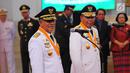 Gubernur dan Wakil Gubernur terpilih Maluku Utara Abdul Gani Kasuba (kiri) dan Al Yasin saat mengikuti proses pelantikan di Istana Negara, Jakarta, Jumat (10/5/2019). Abdul Gani dan Al Yasin merupakan pasangan Gubernur dan Wagub hasil Pilkada Serentak 2018. (Liputan6.com/Angga Yuniar)
