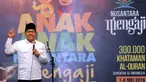 Ketua Umum DPP PKB Muhaimin Iskandar memberikan ceramah saat meresmikan Gerakan Anak Nusantara Mengaji di Jakarta, Kamis (5/5/2016). Gerakan ini akan dilaksanakan secara serentak di seluruh Indonesia pada 7-8 Mei 2016. (Liputan6.com/Helmi Fithriansyah)