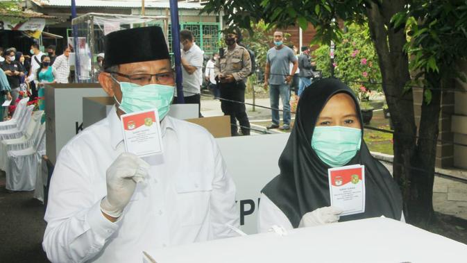 Akhyar Nasution dan istri gunakan hak pilih