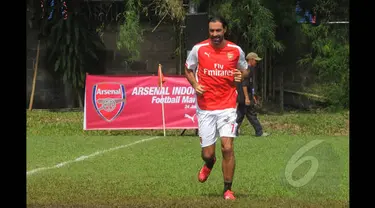 Legenda Arsenal, Robert Pires ikut ambil bagian pada Arsenal Football Marathon di International Sport Club of Indonesia, Ciputat, Sabtu (24/1/2015). (Liputan6.com/Herman Zakharia)