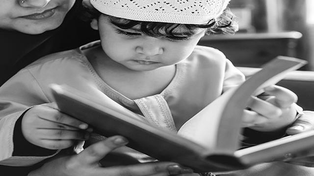 Anak baca Al-Qur'an
