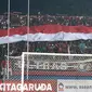 Suporter Timnas Indonesia di Piala AFF U-16 2018 di Stadion Gelora Delta, Sidoarjo. (Bola.com/Aditya Wany)