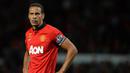 Mantan bek Manchester United, Rio Ferdinand, pada tahun 2002 diduga pernah terlibat kekerasan dan pemerkosaan terhadap seorang wanita muda. Kemudian 2011, dirinya juga dikabarkan melakukan perselingkuhan. (AFP/Andrew Yates)