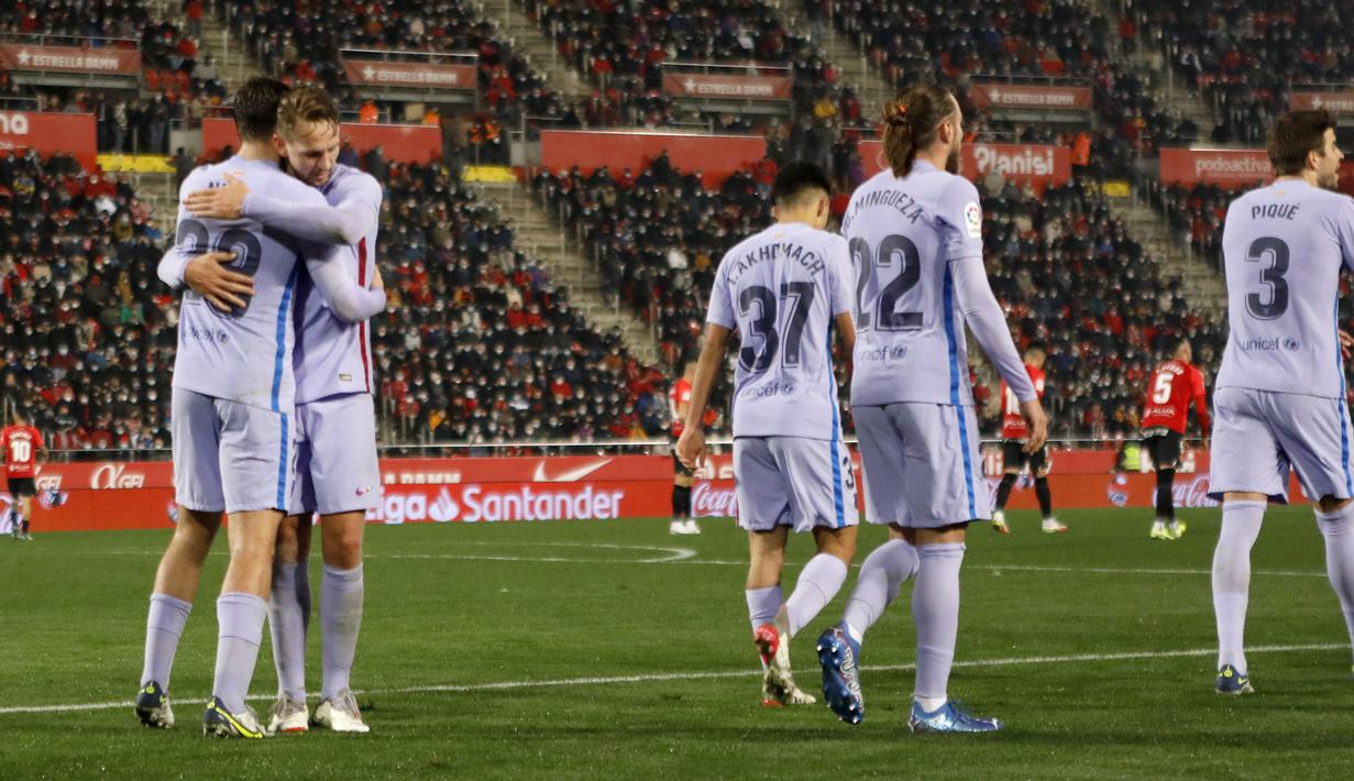 Berkat kemenangan ini Los Cules kini berada di urutan kelima klasemen sementara La Liga dengan nilai 31. sementara Mallorca di peringkat ke-15 dengan 20 poin. (AP/Francisco Ubilla)