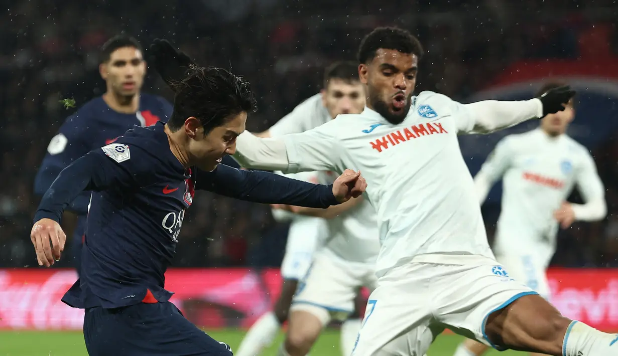 PSG unggul 11 poin atas AS Monaco yang ada di peringkat kedua. (FRANCK FIFE / AFP)