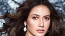 Saat pemotretan dirinya terlihat menggunakan riasan tebal, begitu memesona dengan makeup matte. Bahkan penampilan Pevita Cleo Eileen Pearce dengan makeup tebal ini dipuji netizen bak seleb Hollywood. (Liputan6.com/IG/@pevpearce)