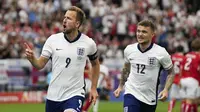 Kegembiraan striker Inggris, Harry Kane usai menjebol gawang Denmark pada laga kedua Grup C Euro 2024, Kamis (20/6/2024) malam WIB. (AP Photo/Themba Hadebe)