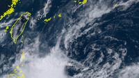 Gambar satelit menunjukkan sekelompok besar hujan dan badai di dekat Filipina pada Selasa sore, waktu setempat. (Badan Meteorologi Jepang / Himawari 8)