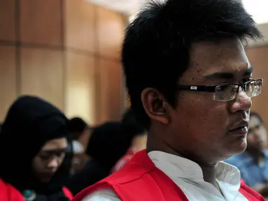 Ahmad Imam Al Hafitd dan Assyifa Ramadhani saat akan menjalani sidang tuntutan Jaksa, Jakarta, Selasa (28/10/2014). (Liputan6.com/Johan Tallo)