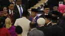 Presiden Joko Widodo atau Jokowi (tengah) menghadiri sidang Tahunan MPR Tahun 2019 di Kompleks Parlemen, Senayan, Jakarta, Jumat (16/7/2019). Sidang tersebut beragendakan penyampaian pidato kenegaraan Presiden Jokowi dalam rangka HUT Ke-74 Kemerdekaan Republik Indonesia. (Liputan6.com/Johan Tallo)