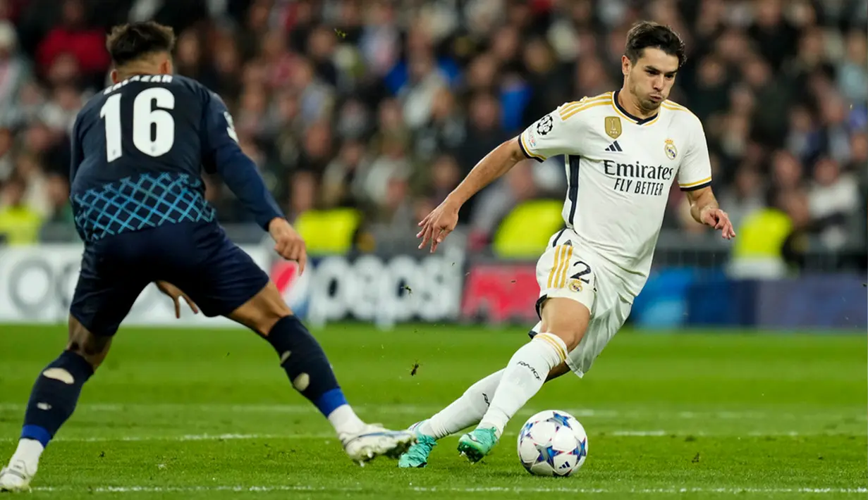 Real Madrid lolos ke babak 16 besar Liga Champions 2023/2024. Kepastian itu didapat setelah pasukan Carlo Ancelotti mengalahkan Braga 3-0. (AP Photo/Jose Breton)