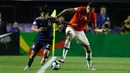 Gelandang Jepang, Takefusa Kubo menggiring bola melewati pemain Chile Guillermo Maripan selama pertandingan grup C Copa America 2019 di Stadion Morumbi, Sao Paulo, Brasil (17/6/2019). Kubo merupakan remaja 18 tahun yang dijuluki 'Messi Jepang'. (AP Photo/Victor R. Caivano)