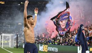 Pemain muda PSG, Desire Doue, melakukan selebrasi setelah mencetak gol ke gawang Inter Milan pada final Liga Champions 2024/2025 di Stadion Allianz Arena, Munich, Minggu (1/6/2025) dini hari WIB. (Sven Hoppe/dpa via AP)