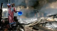 Ledakan pipa minyak di Lagos, Nigeria pada 26 Desember 2006. Peristiwa itu menewaskan 260 orang tewas (AP)
