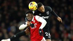 West Ham sempat merepotkan Arsenal tapi memang The Gunners masih terlalu tangguh bagi mereka. (AP Photo/David Cliff)