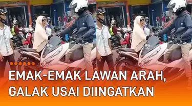 Aksi nekat emak-emak terekam kamera warga. Terjadi di sebuah jalanan yang ramai kendaraan. Emak-emak bermotor memboncengkan anak melawan arus dan berpapasan angkot.