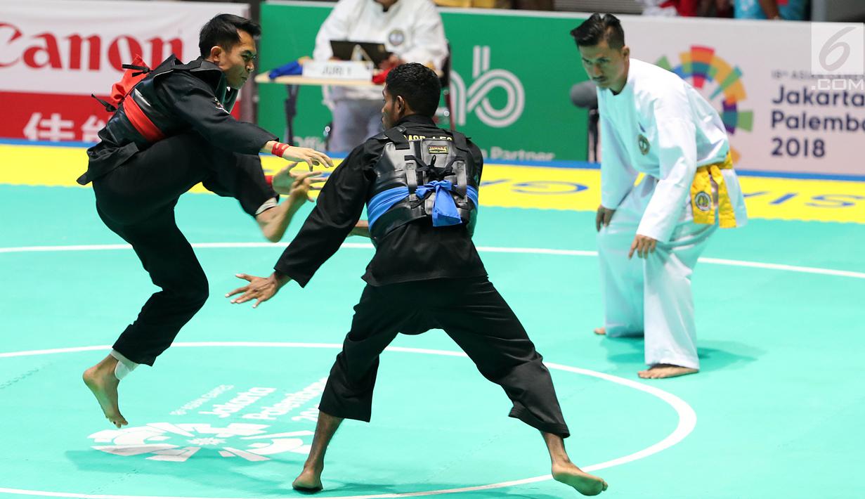 FOTO Pesilat  Komang Harik Menang Telak Atas Timor Leste 