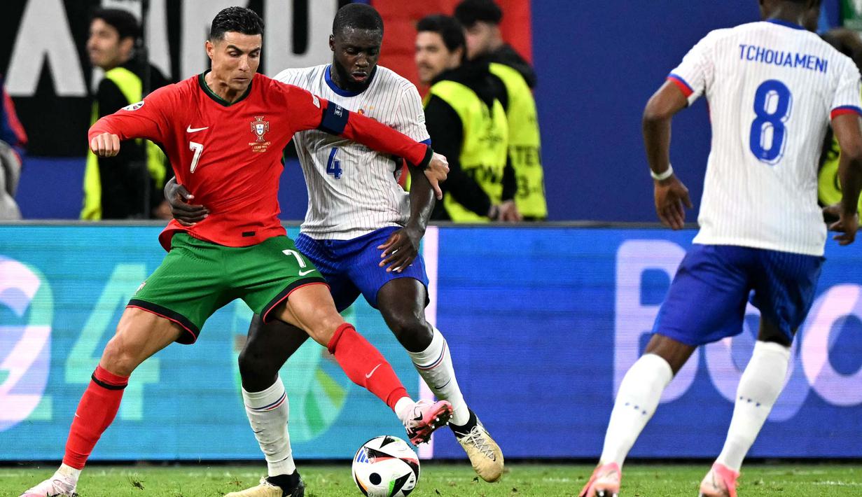 Laga berlanjut ke 2x15 menit babak tambahan. Hingga akhir pertandingan, skor imbang tidak berubah. (PATRICIA DE MELO MOREIRA/AFP)