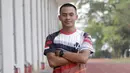 Atlet lari gawang 400 meter, Halomoan, berpose sebelum melakukan latihan fisik di Stadion Madya, Jakarta, Kamis, (17/9). Latihan tersebut untuk persiapan SEA Games 2019. (Bola.com/M Iqbal Ichsan)