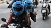 Sejumlah anggota dari komunitas Elmo And Friends berkonvoi menggunakan sepeda motor di kawasan Menteng, Jakarta, Minggu (11/11). Dengan mengenakan batik, mereka melakukan konvoi dalam rangka merayakan Hari Pahlawan. (Merdeka.com/ Iqbal S. Nugroho)