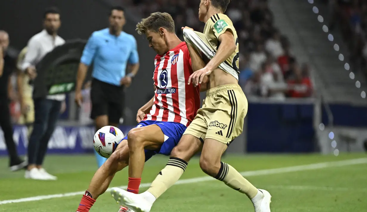Gol-gol kemenangan Atletico Madrid masing-masing disumbangkan oleh Alvaro Morata, Memphis Depay, dan Marcos Llorente. (Photo by JAVIER SORIANO / AFP)