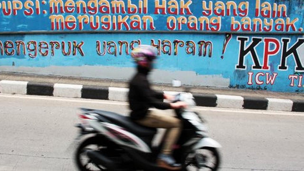Mendidik antikorupsi dengan cerpen, puisi dan karikatur