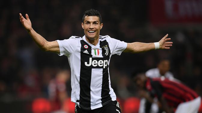 Cristiano Ronaldo mencetak gol ke gawang AC Milan. (AFP/Marco Bertorello)