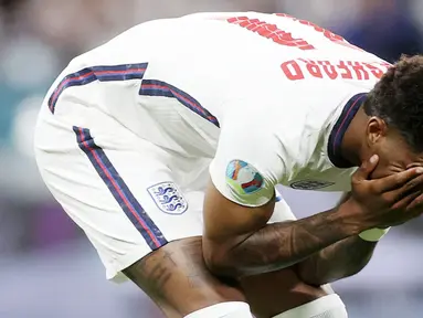 Marcus Rashford - Kegagalan penyerang Manchester United ini dalam mengeksekusi penalti di laga final Euro 2020 melawan Italia merupakan salah satu penyebab Timnas Inggris gagal menjadi juara Eropa untuk pertama kalinya. (Foto:AP/Carl Recine,Pool)