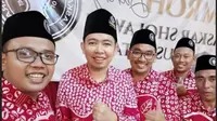 Bendahara Ansor Jatim Fawait bersama kader Ansor Kencong dan Laskar Sholawat Nusantara.  (Istimewa).