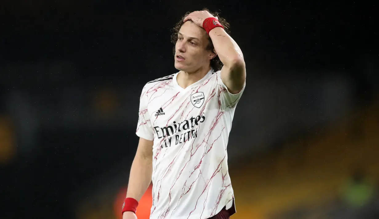Kontrak antara David Luis dan Arsenal sudah berakhir. Pada musim lalu, pemain 34 tahun ini bermain sebanyak 20 pertandingan Liga Inggris bersama The Gunners. Ia mengungkapkan ingin mengakhiri kariernya di Benfica, salah satu klub di Portugal. (Foto: AFP/Nick Potts)