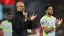 Meski masih tersisa satu pertandingan di Liga Inggris, skuad asuhan Pep Guardiola tak akan mampu menyusul raihan poin Arsenal. Mereka terpaut empat poin di klasemen sementara. (AP Photo/Ian Walton)