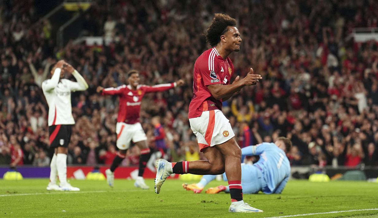 Manchester United berhasil mengamankan kemenangan atas Fulham dalam duel pembuka Premier League 2024/2025. Setan Merah menang tipis 1-0 di hadapan pendukung sendiri. (Martin Rickett/PA via AP)