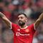 Bruno Fernandes saat ini menjadi pemain vital di skuat Manchester United. Didatangkan dari Sporting CP pada transfer musim dingin 2020, Setan Merah harus merogoh kocek sebesar 63 juta euro. Sejauh ini, Bruno telah mencetak 45 gol dan 24 assist dalam 104 laga bersama MU. (AFP/Adrian Dennis)