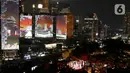 Video mapping dan kembang api menjadi salah satu atraksi yang bisa dinikmati dari lokasi makan malam. (Liputan6.com/Herman Zakharia)