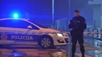 Polisi memblokir area sekitar Kedutaan Besar AS di ibu kota Montenegro, Podgorica pada 22 Februari 2018. (AFP PHOTO)