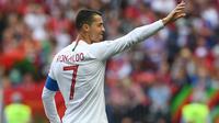 Selebrasi kapten Timnas Portugal, Cristiano Ronaldo usai mencetak gol ke gawang Maroko pada matchday kedua Grup B Piala Dunia 2018. (Byline / Source / Credit Francisco LEONG / AFP)