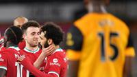 Liverpool memetik kemenangan 1-0 atas Wolverhampton Wanderers pada laga pekan ke-28 Premier League di Molineux Stadium, Selasa (16/3/2021) dini hari WIB. (AFP/POOL/Paul Ellis)