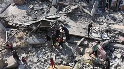 78 warga Palestina dilaporkan meninggal dunia akibat serangan udara dan artileri yang dilakukan militer Israel di jalur Gaza pada Jumat (27/6/2025) waktu setempat. (Omar AL-QATTAA/AFP)