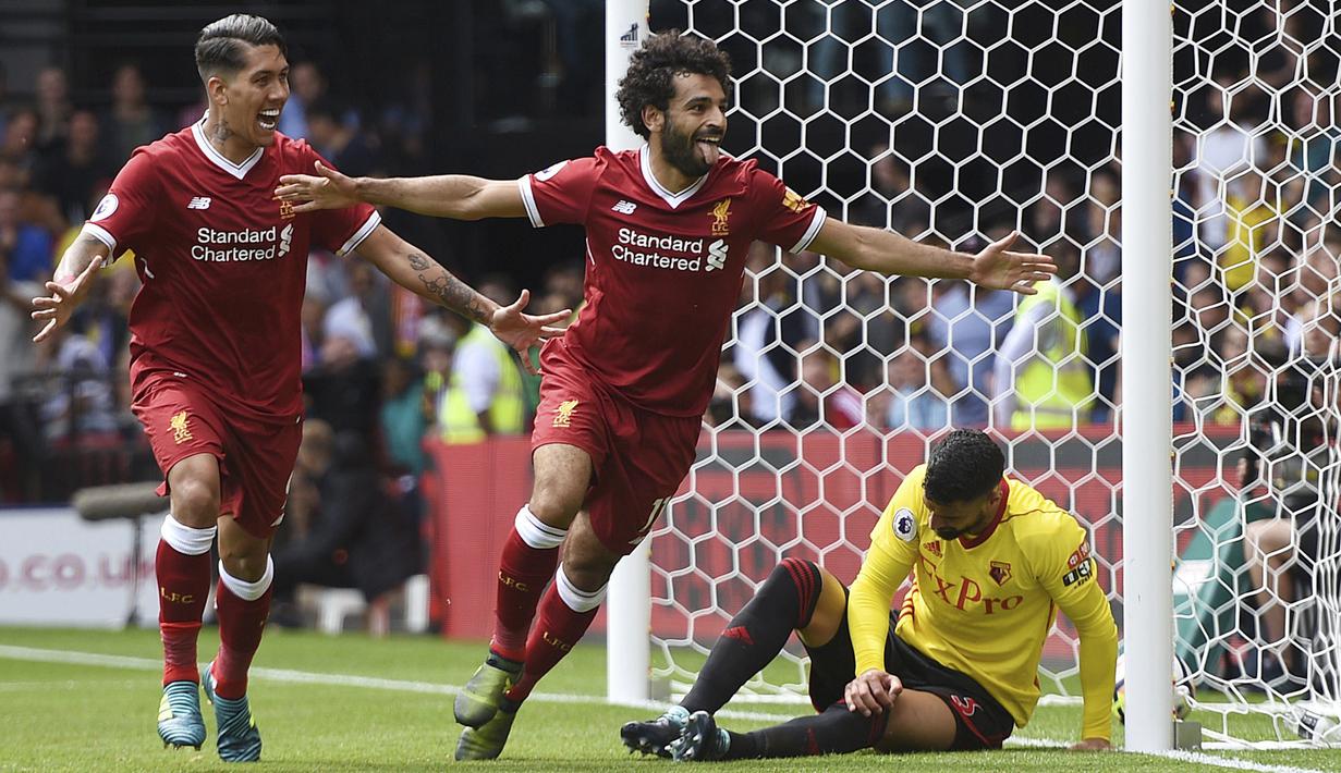 Ekpresi pemain Liverpool, Mohamed Salah (tengah) usai mencetak golke gawang Watford pada laga Premier League di Vicarage Road, Watford, (12/8/2017). Liverpool bermain imbang 3-3. (Daniel Hambury/PA via AP)