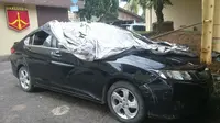 Mobil korban penembakan Brigadir K sudah diamankan di Polda Sumsel (Liputan6.com/Nefri Inge)