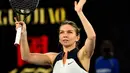 Petenis putri asal Rumania, Simona Halep harus menarik diri dari Olimpiade Tokyo 2020 karena cidera betis yang dialaminya. Masalah ini pula yang memaksa dirinya absen di turnamen Wimbledon 2021, Inggris. (Foto: AFP/William West)