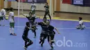 Pemain BJL 2000, Rizky Pamungkas, merayakan gol yang dicetaknya saat final turnamen futsal Bolalob FFI U-20. Gol tersebut menjadi gol penyeimbang 2-2. (Bola.com/M Iqbal Ichsan)