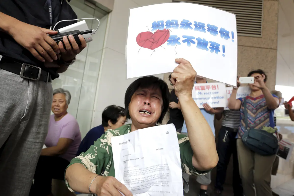 20150806-Puing MH370 Terkonfirmasi, Keluarga Minta Pencarian Dilanjutkan-China
