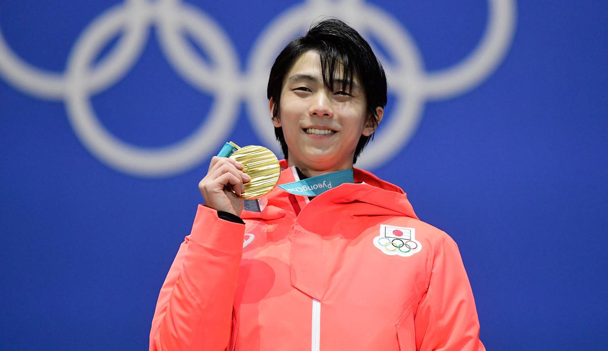 Yuzuru pernah meraih medali emas pada ajang Olimpiade sebanyak dua kali, yaitu saat Olimpiade Musim Dingin Sochi 2014 dan Olimpiade Pyongyang 2018. (AFP/Javier Soriano)