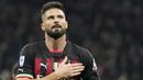 Pemain AC Milan, Olivier Giroud, melakukan selebrasi setelah mencetak gol ke gawang Sampdoria pada laga Liga Italia di Stadion di San Siro, Sabtu (20/5/2023). Rossonerri menang dengan skor 5-1. (AP Photo/Antonio Calanni)
